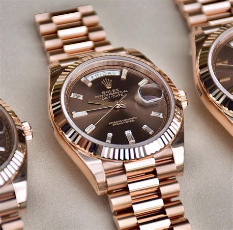 rolex rose gold day date.